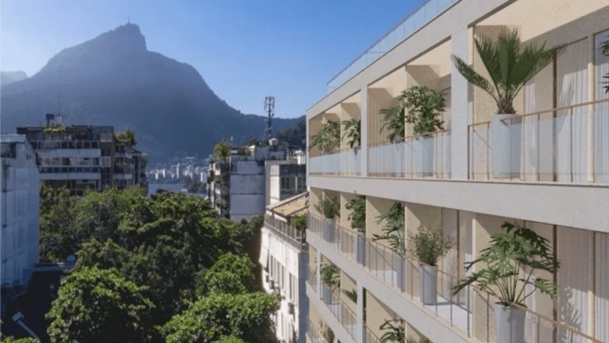 Fachada moderna do Garcya Praia Studios com vista para o Cristo Redentor